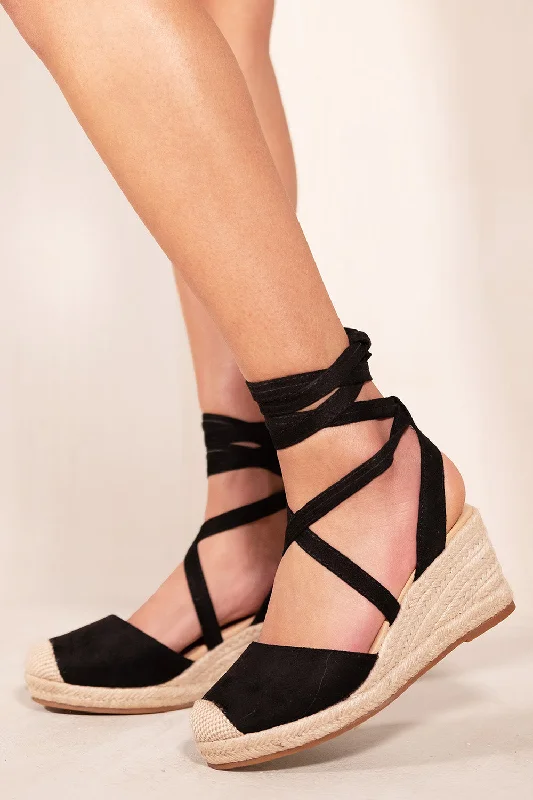 High-quality Fabrics JUNIPER LOW WEDGE ESPADRILLE SANDALS WITH LACE UP DETAIL IN BLACK SUEDE